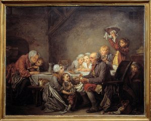 Le gâteau des rois Une famille partageant le gâteau à la fête de l