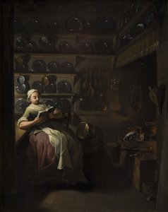 Intérieur de cuisine avec une fille lisant