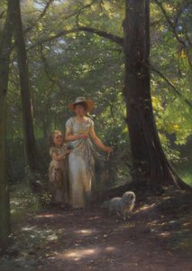 Dame avec un petit chien dans la forêt de hêtres