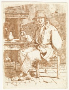 Homme riant avec un verre à la main