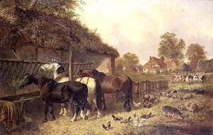 Trois chevaux à une mangeoire