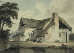Cottage au toit de chaume près d