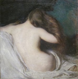 Femme se séchant les cheveux