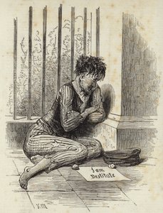 Mendiant dans la rue avec une pancarte indiquant Je suis démuni