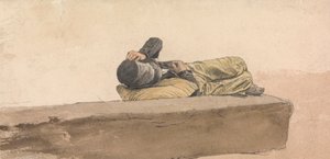 Un garçon allongé