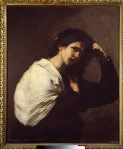 Femme se déchirant les cheveux