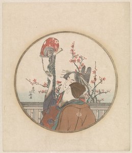 Couple avec un singe et une branche en fleurs
