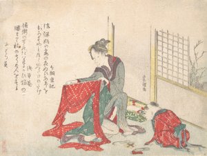 Femme pliant du tissu - Katsushika Hokusai