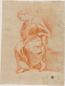 Femme assise de profil