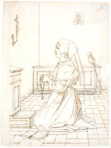 Femme agenouillée en prière