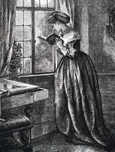 Une jeune femme lisant près d