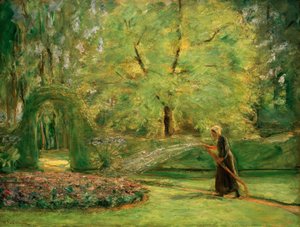 Le rond-point dans le jardin de haies avec arroseuse de fleurs