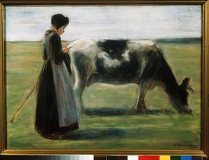 Une jeune fille avec une vache