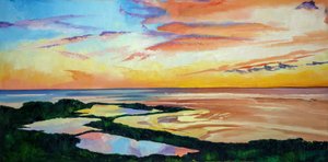 Un coucher de soleil éclatant sur la côte