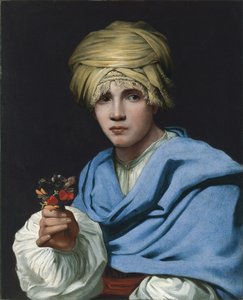 Garçon en turban tenant un bouquet