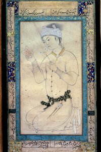 Jeune homme avec des livres et des narcisses. Miniature persane à la gouache de Muhammad Shaykh