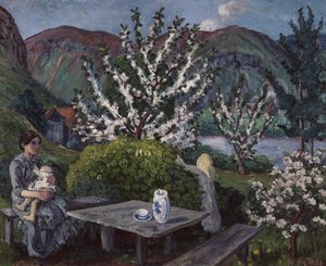 Mère et enfant à la table de jardin