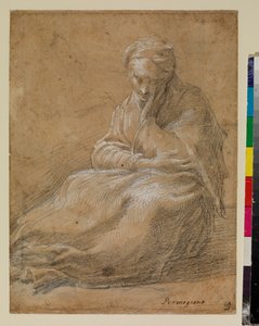 Femme assise par terre