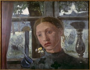 Tête de fille devant une fenêtre