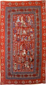 Une tenture brodée en drap de laine rouge avec des rangées de figures représentant la vie de Joseph