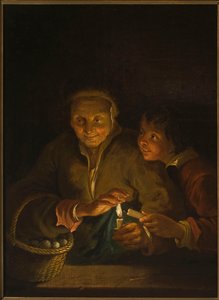 Vieille femme et garçon avec une bougie