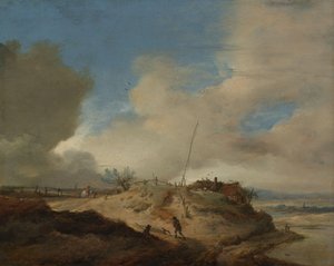 Paysage de dunes avec un poteau de signalisation