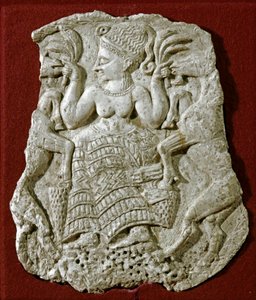 Art phénicien : couvercle de pyxide sculpté en ivoire, représentant une déesse de la fertilité mycénienne nourrissant des chèvres