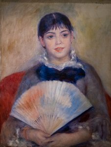 Jeune femme avec un éventail
