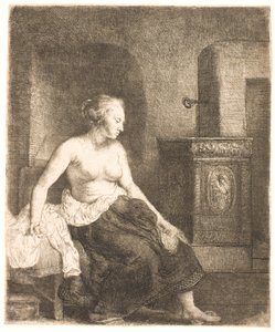 Femme assise à moitié habillée près d