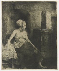 Femme assise à moitié habillée près d