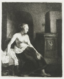 Femme assise à moitié habillée près d