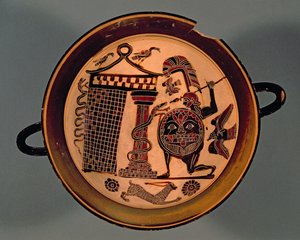 Coupe à figures noires laconiennes représentant un guerrier attaquant un serpent, VIe siècle av. J.-C.