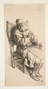 Vieil homme dormant dans un fauteuil