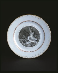 Assiette blanche bordée d