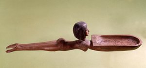 Antiquité égyptienne : Cuillère en bois pour cosmétique appelée nageuse nue tenant un canard. 18e dynastie, nouvel empire. Paris, Musée du Louvre