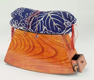 Appui-tête avec coussin et tiroir
