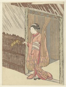 Fille avec une branche de yamabuki en main