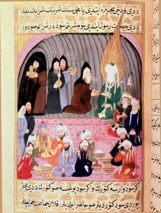 Le Prophète Muhammad (Mahomet) (570-632) (visage couvert) en voyage en Syrie est accueilli par des moines chrétiens qui lui servent un repas. Miniature turque du 18e siècle. Musée Topkapi, Istanbul, Turquie