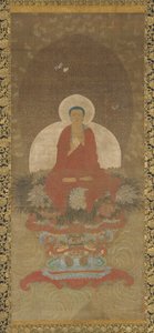 Bouddha en trône sur un tapis de Kusa