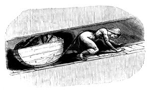 Femme tireuse traînant un traîneau de charbon le long d