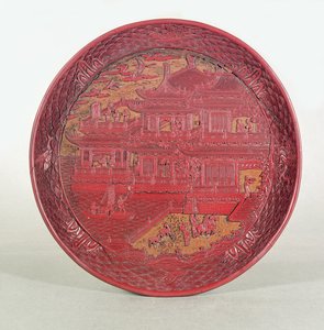 Plat en laque, sculpté, représentant le 