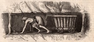 Une fille enchaînée à un chariot plein de charbon et le traînant dans une mine de charbon anglaise