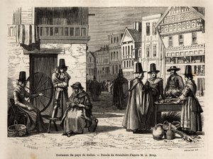 Une rue au Pays de Galles, avec des habitants vêtus de costumes traditionnels, et des activités quotidiennes : une famille et des femmes filant la laine avec des rouets. Gravure pour illustrer un voyage au Pays de Galles, en 1862, par Alfred Erny, dans « L - Unknown artist