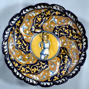Coupe en faïence godronnée décorée d