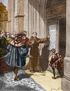 Martin Luther (1483-1546) accrochant ses 95 thèses à Wittenberg.