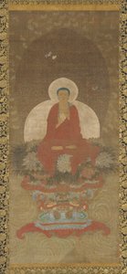 Bouddha en trône sur un tapis de Kusa