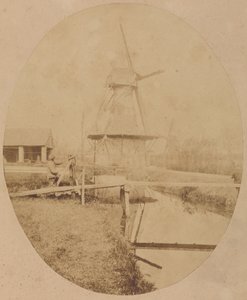 [Peintre en chapeau au chevalet peignant un moulin à vent] - Unknown artist