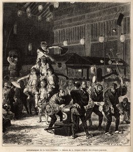 Saltimbanques de rue : jongleurs, équilibristes et acrobates, lors de spectacles nocturnes, à la foire annuelle d
