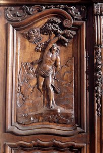 Le martyre de Saint Sébastien (détail) de la porte en bois sculptée de l