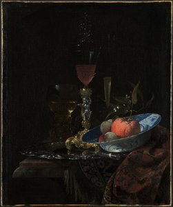 Verre de vin et bol de fruits